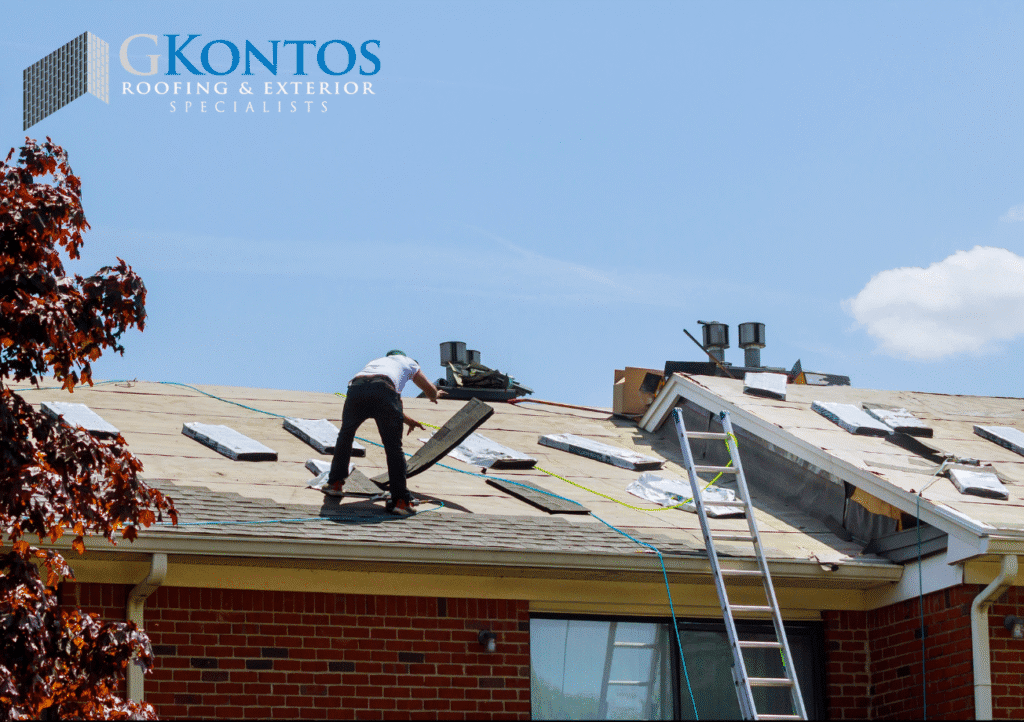 Construction crew replacing a roof.